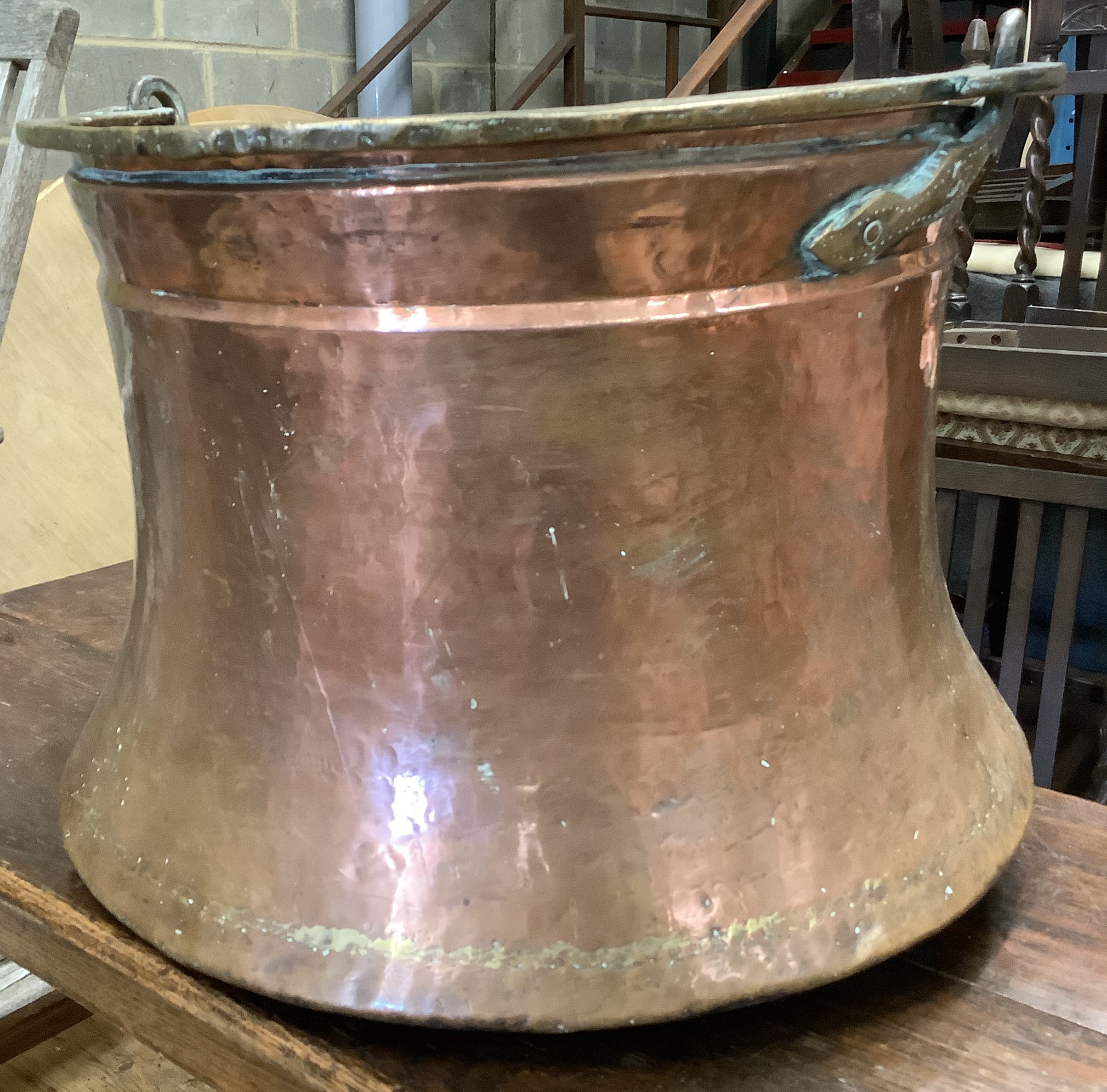 A large Eastern copper and brass cauldron, diameter 46cm, height 38cm